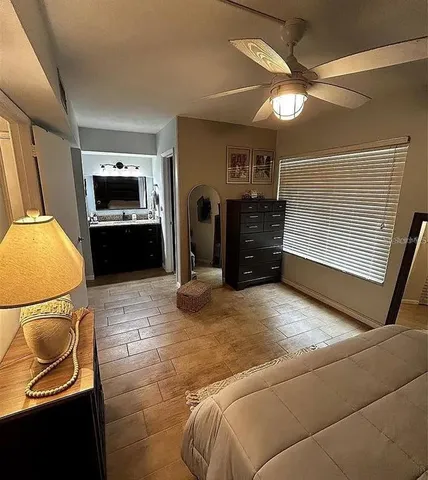 a living room with a couch and a flat screen tv