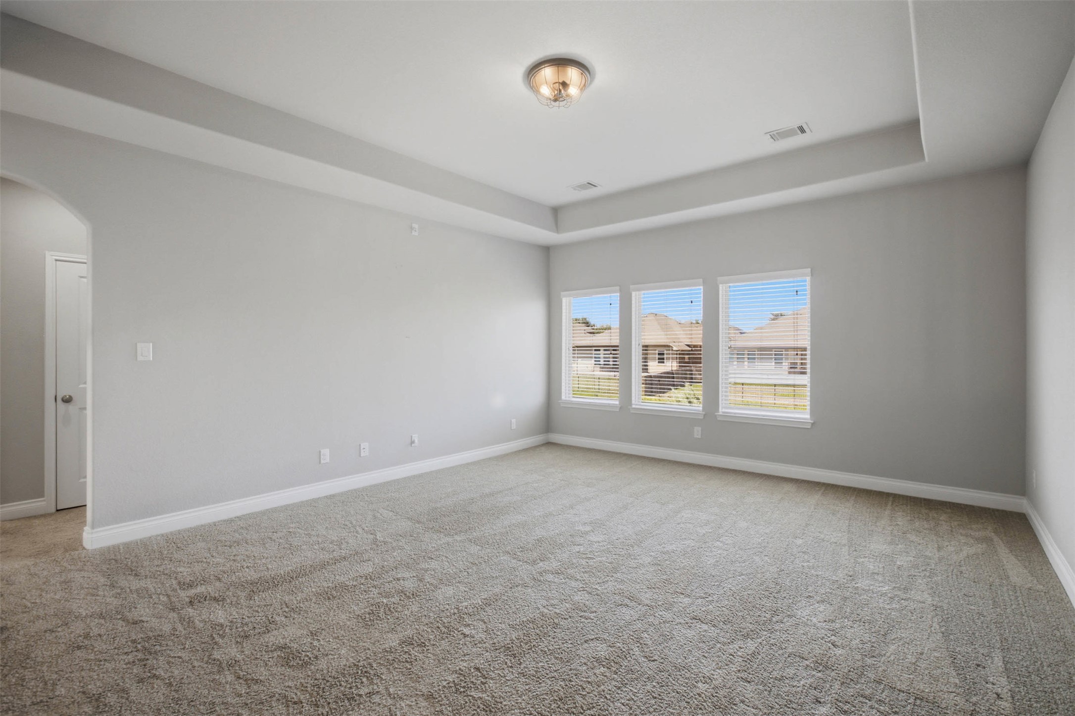 3101 Rabbit Creek Drive Georgetown, TX 78626 - Photo 20 of 38 A generously sized Game room overlooking the 2 story entry with plush carpeting and natural light from a trio of windows.