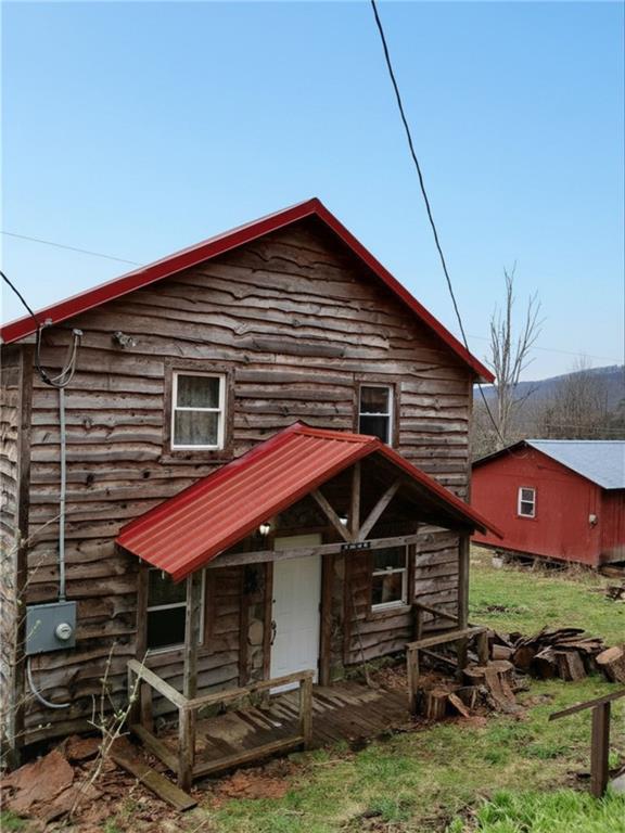 a front view of a house with parking