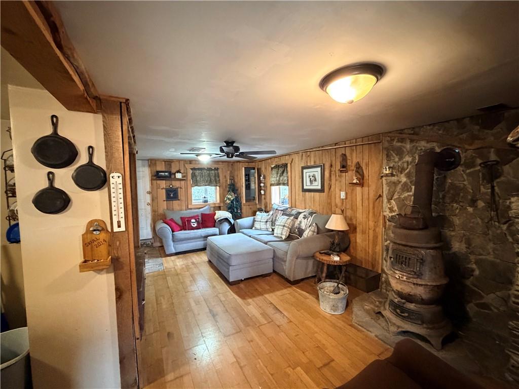 2964 Dawson Run Road West Hickory, PA 16370 - Photo 16 of 41 The living room showcases a working potbelly stove, giving that warm cozy feeling on a cold winter day.