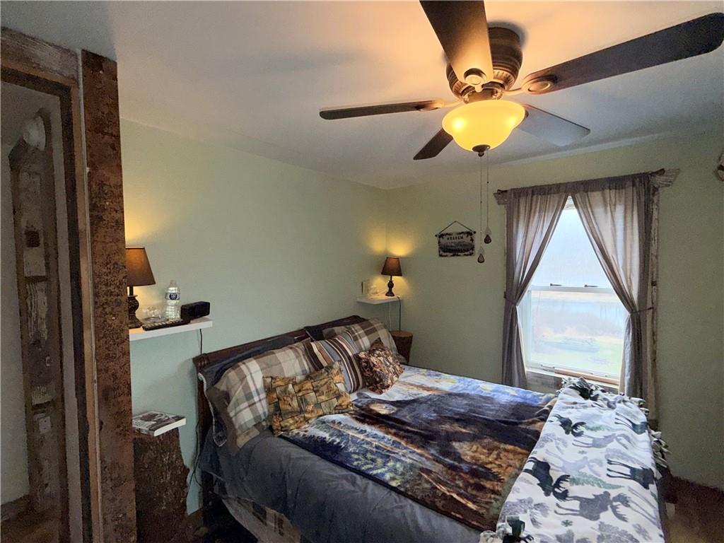 2964 Dawson Run Road West Hickory, PA 16370 - Photo 24 of 39 a bedroom with a bed and a mirror