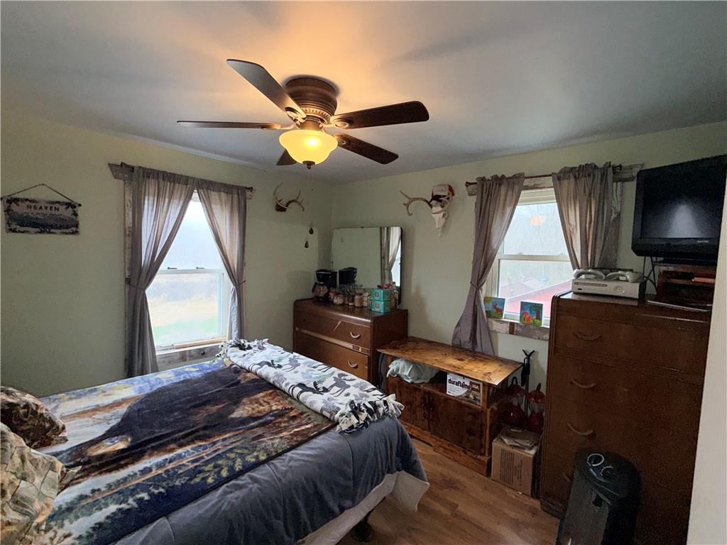 2964 Dawson Run Road West Hickory, PA 16370 - Photo 25 of 39 a bedroom with a bed and a flat screen tv