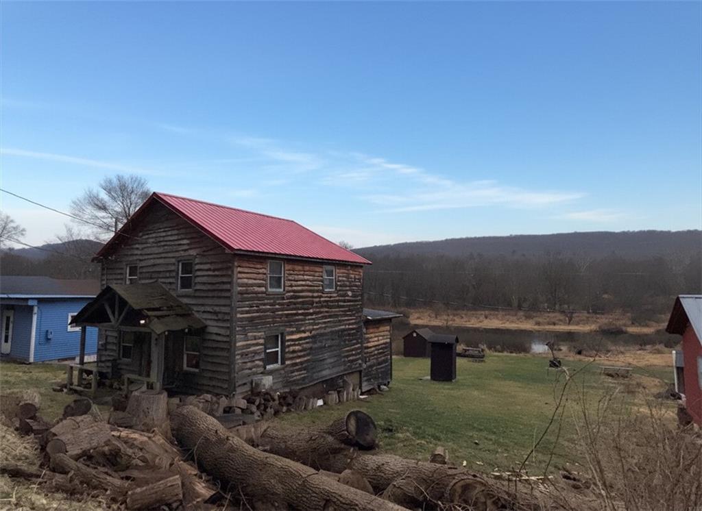 2964 Dawson Run Road West Hickory, PA 16370 - Photo 3 of 41 Enjoy walking from the rear exit and immediately being greeted by a pond which is fed by the Allegheny river