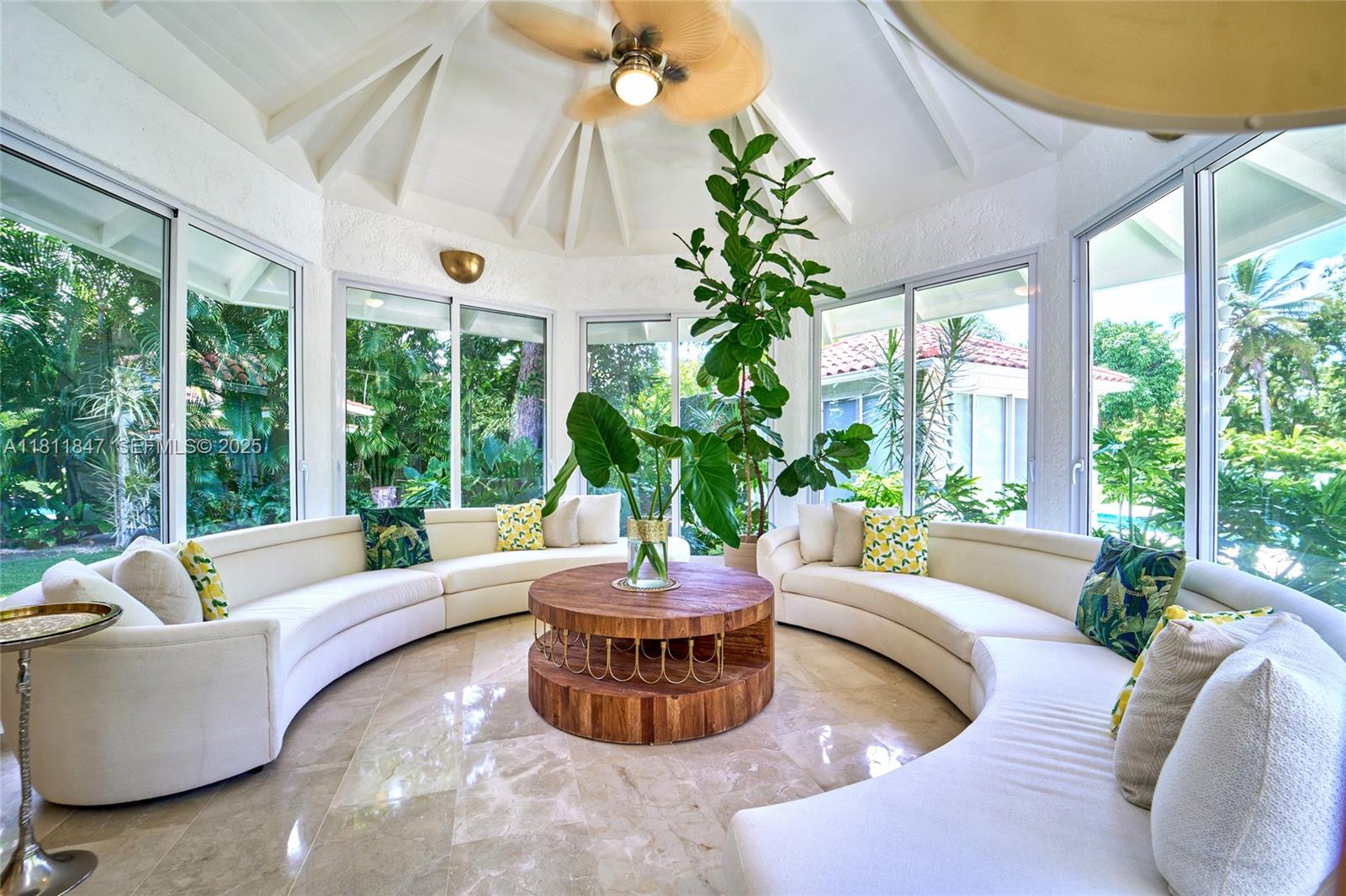 undefined, La Romana 22000 - Photo 2 of 14 a living room with furniture and a potted plant