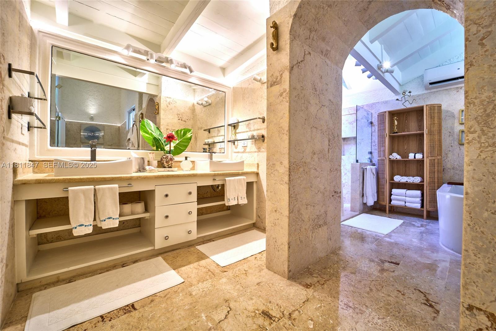 undefined, La Romana 22000 - Photo 6 of 14 a bathroom with a sink and a mirror