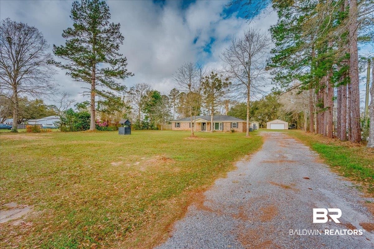 440 Dykes Road Mobile, AL 36608 - Photo 45 of 49 View of road with gravel driveway