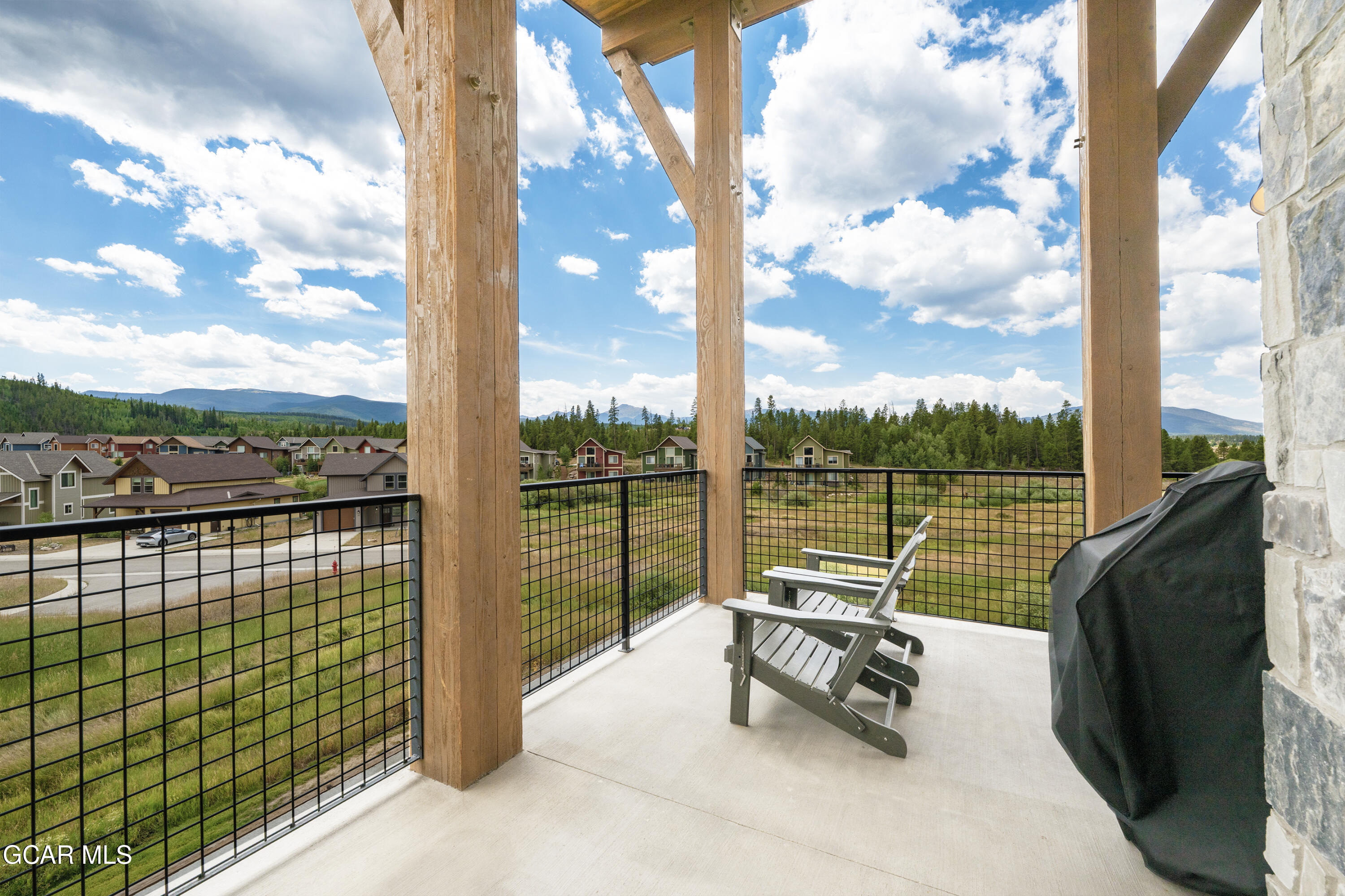 96 Meadow Trail, Unit G304 Fraser, CO 80442 - Photo 5 of 37 a view of a city from a balcony