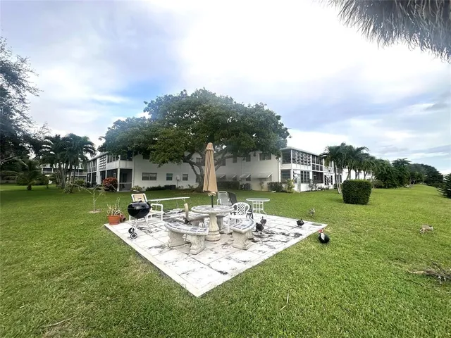 aerial view of a house with a swimming pool