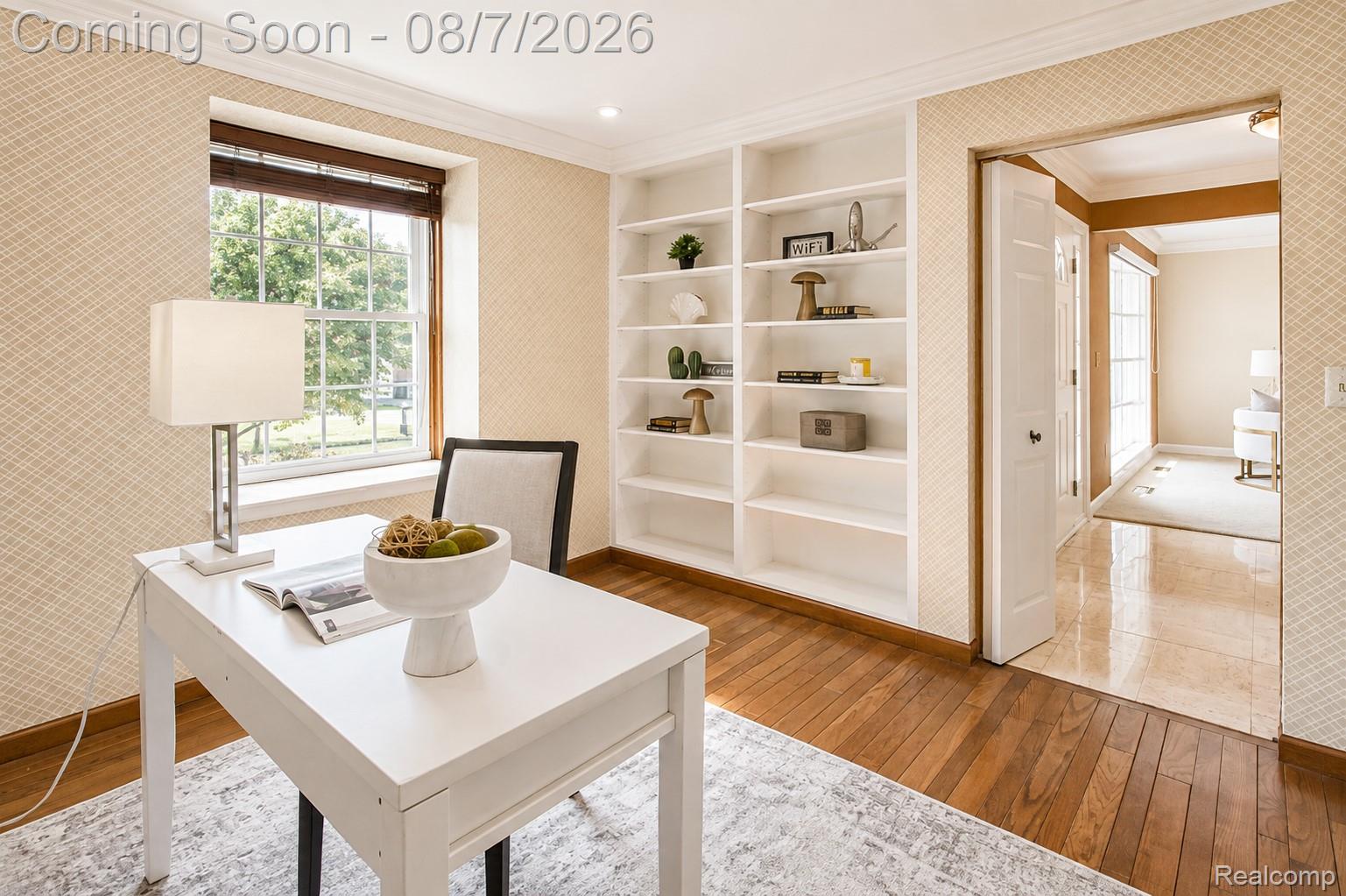 3149 Tamarron Drive Rochester, MI 48309 - Photo 24 of 48 Office space featuring hardwood flooring, patterned wallpaper, a white built-in bookcase, and a large window