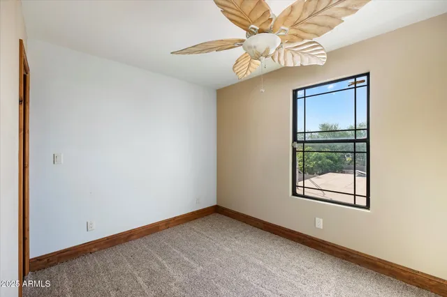 a bathroom with a tub a toilet and a sink