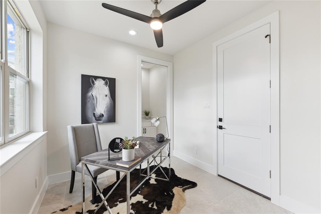3230 Elihu Street, Unit 5 Dallas, TX 75210 - Photo 15 of 17 a view of a workspace with furniture and a window
