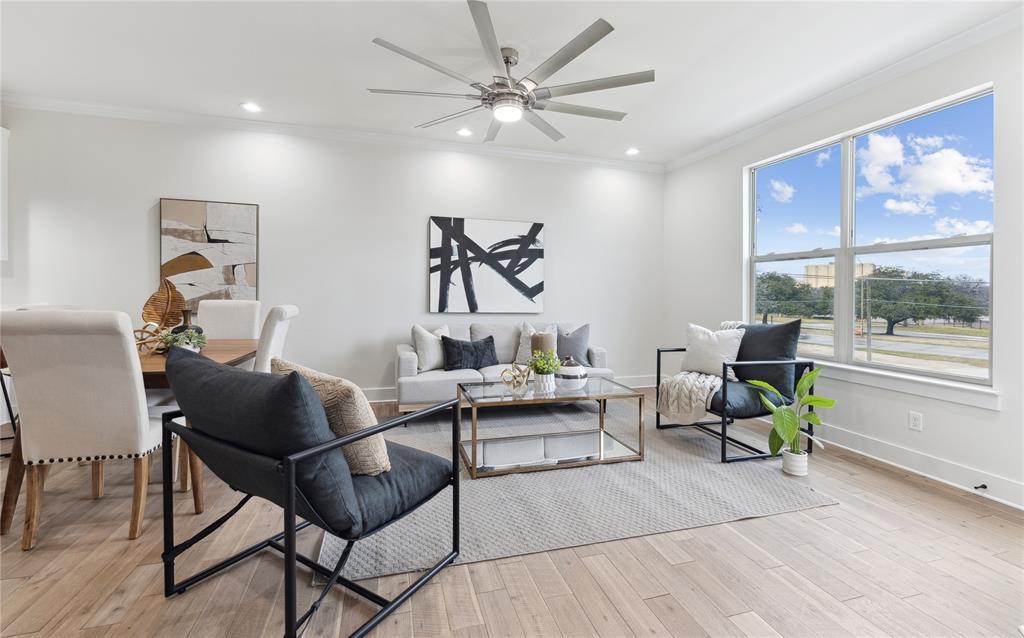 3230 Elihu Street, Unit 5 Dallas, TX 75210 - Photo 4 of 17 a living room with furniture and a large window