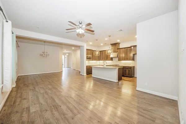 a view of kitchen with wooden floor