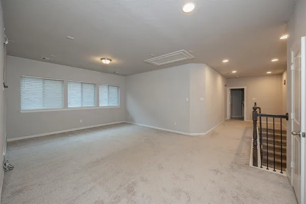 a car parked in front of a house