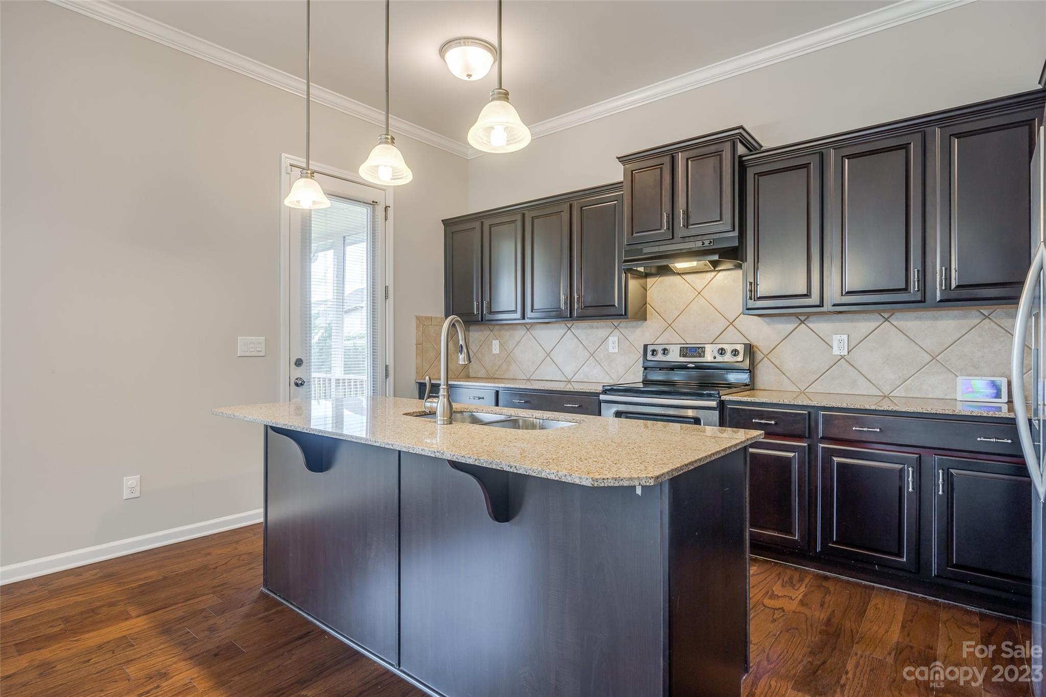 4025 Orchid Way Tega Cay, SC 29708 - Photo 14 of 44 a kitchen with stainless steel appliances granite countertop a sink stove and refrigerator