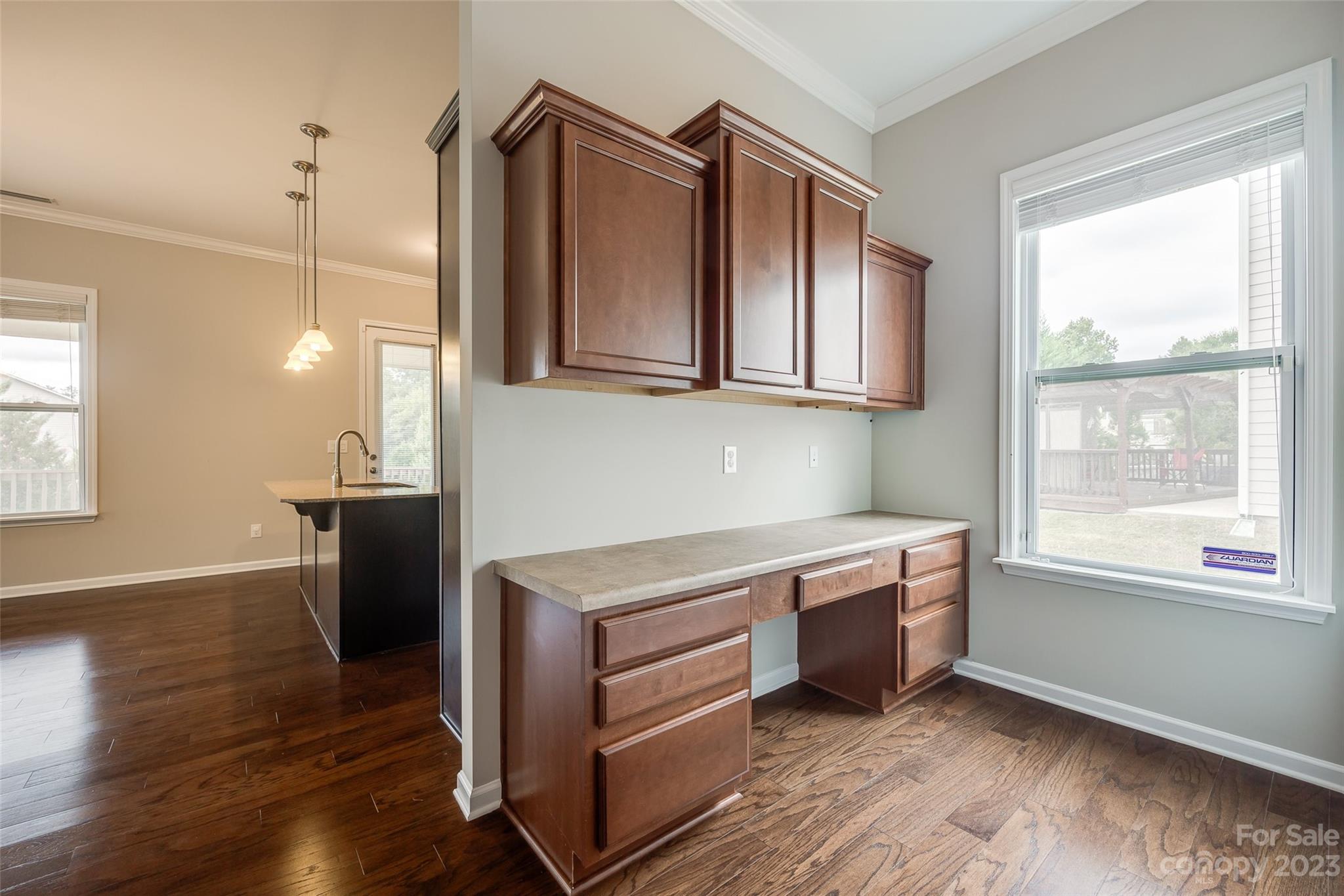 4025 Orchid Way Tega Cay, SC 29708 - Photo 16 of 44 a kitchen with stainless steel appliances granite countertop a stove a sink and a refrigerator