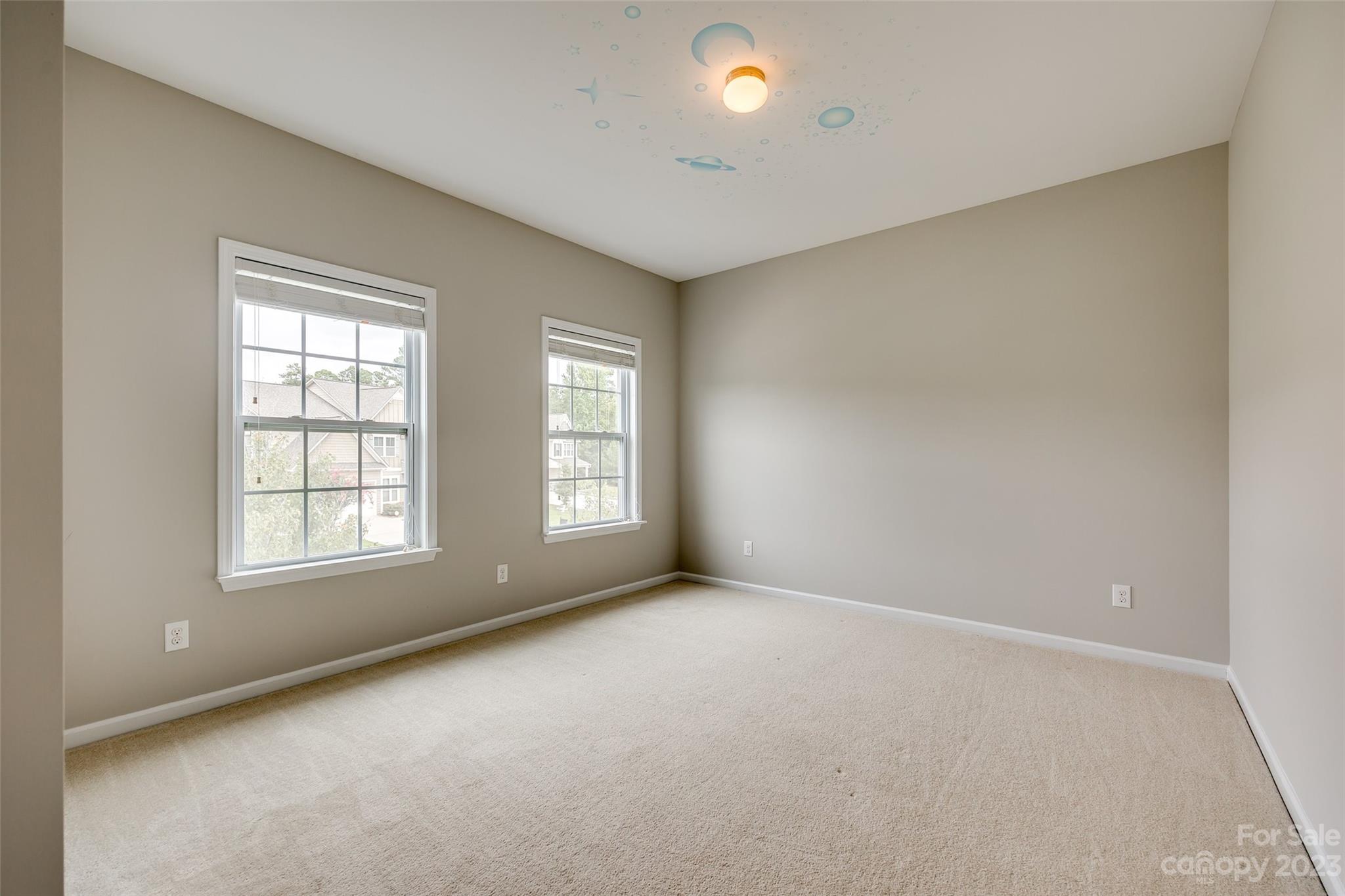4025 Orchid Way Tega Cay, SC 29708 - Photo 20 of 44 an empty room with windows