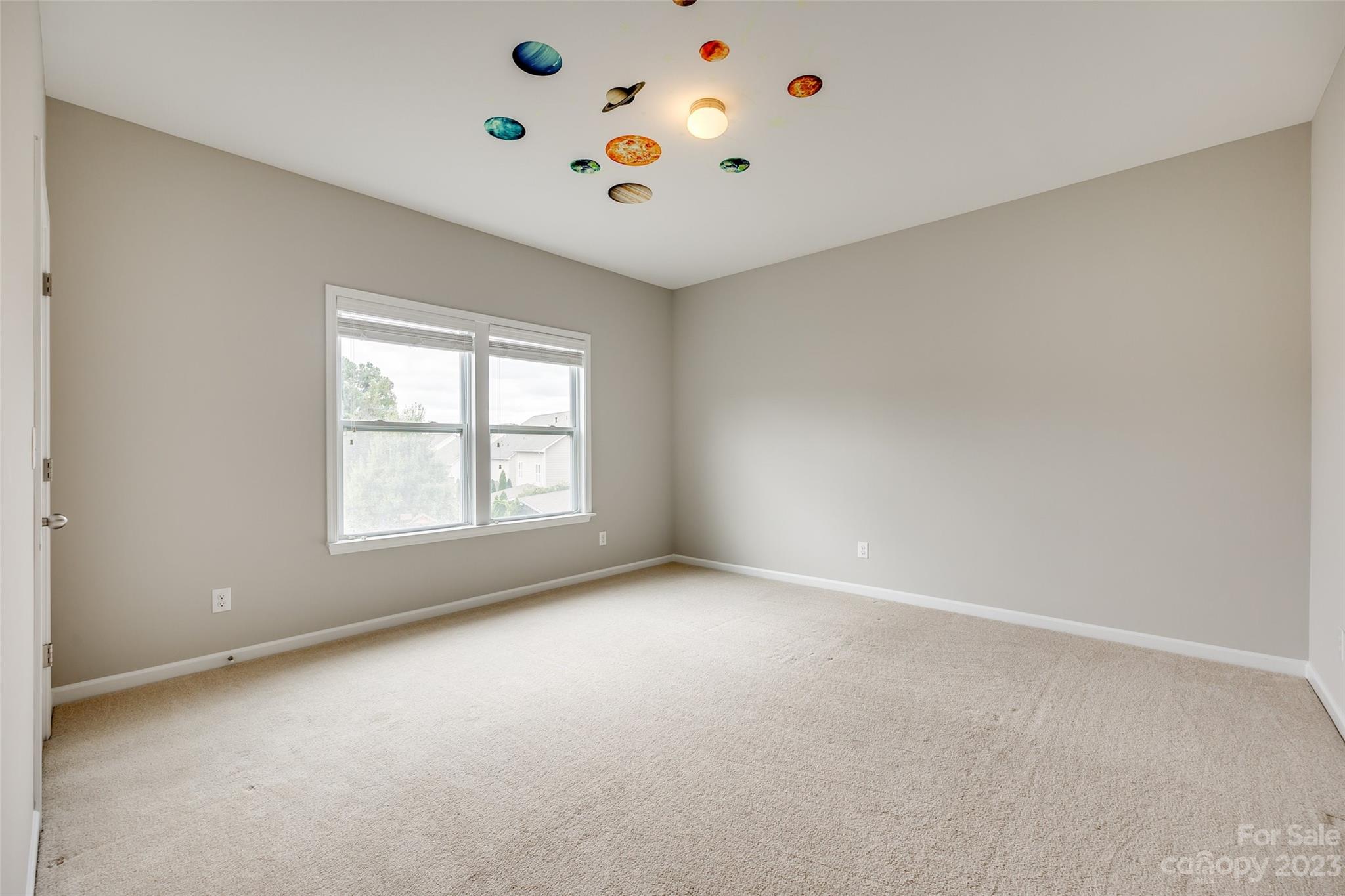 4025 Orchid Way Tega Cay, SC 29708 - Photo 24 of 44 a view of an empty room with a window