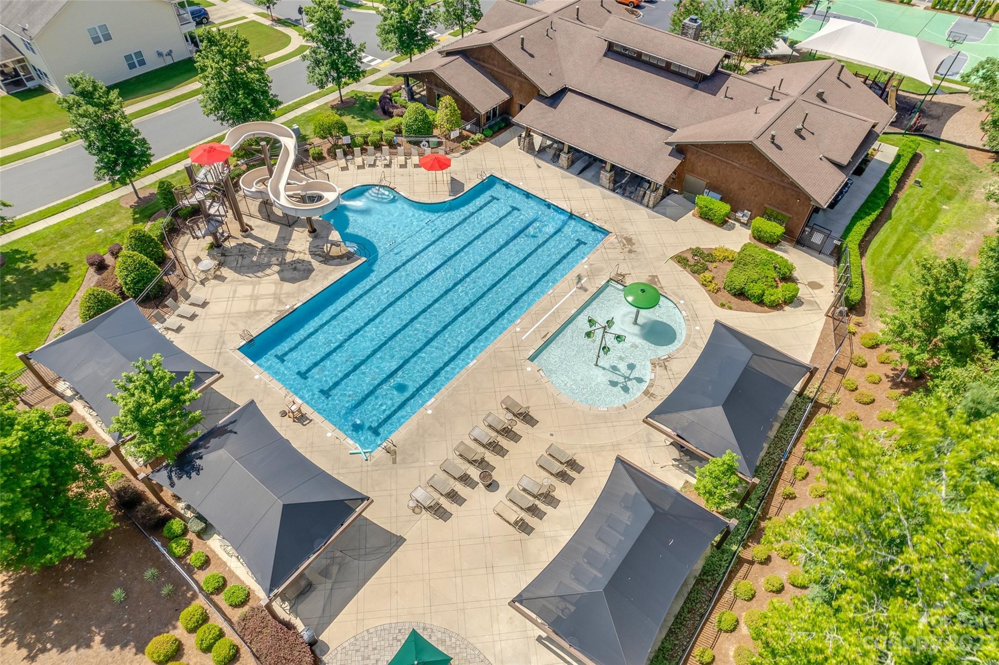 4025 Orchid Way Tega Cay, SC 29708 - Photo 39 of 44 an aerial view of a house with garden