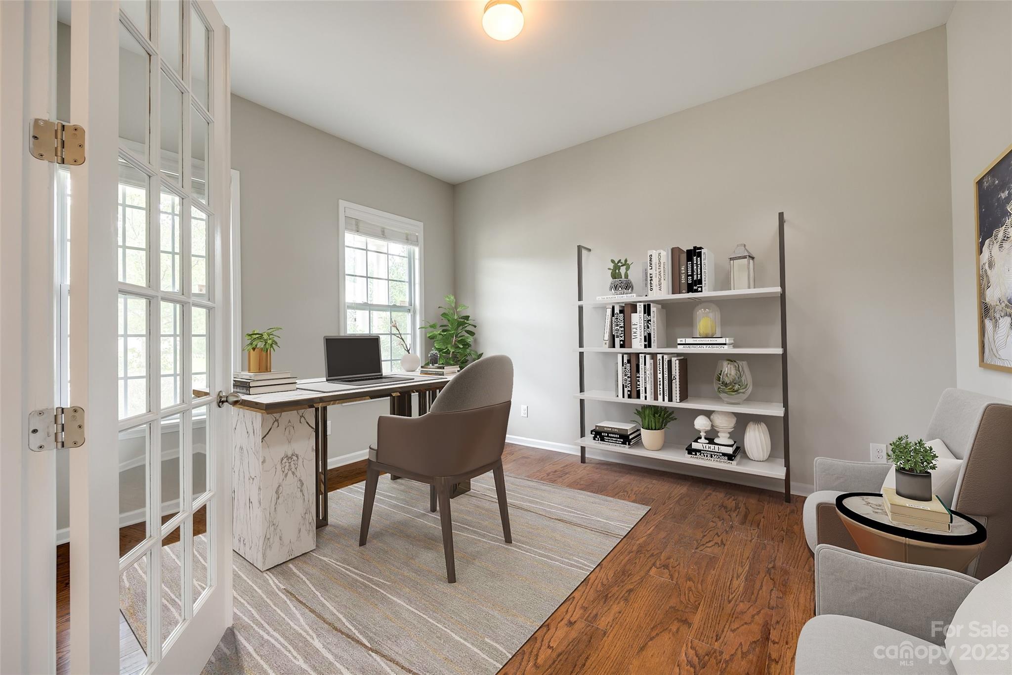4025 Orchid Way Tega Cay, SC 29708 - Photo 4 of 44 a living room with furniture and a wooden floor