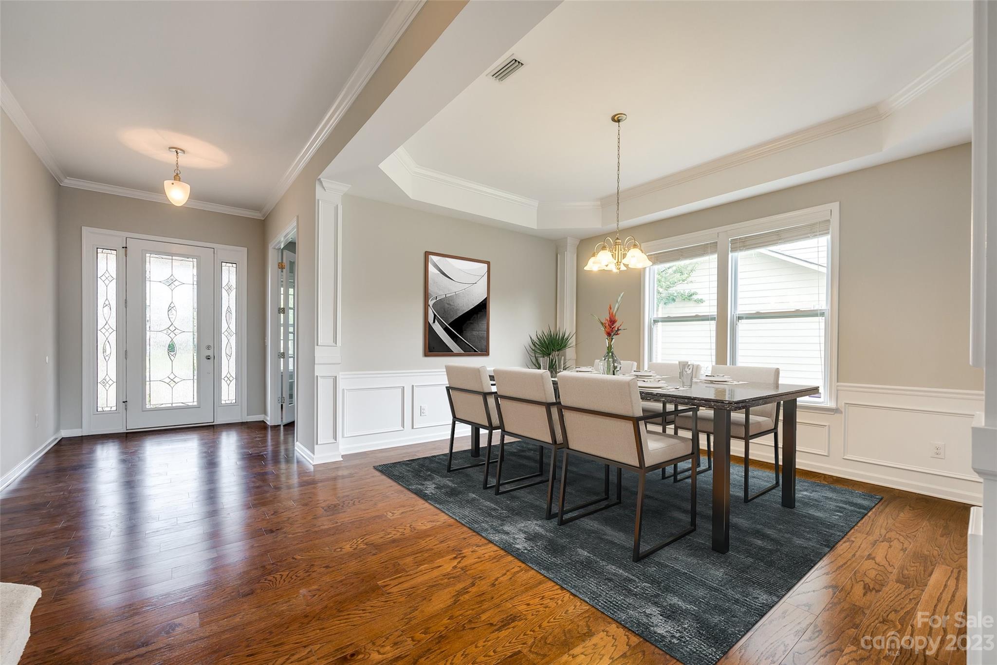 4025 Orchid Way Tega Cay, SC 29708 - Photo 7 of 44 a view of a dining room with furniture window and wooden floor