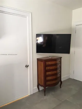 a room with a flat screen tv