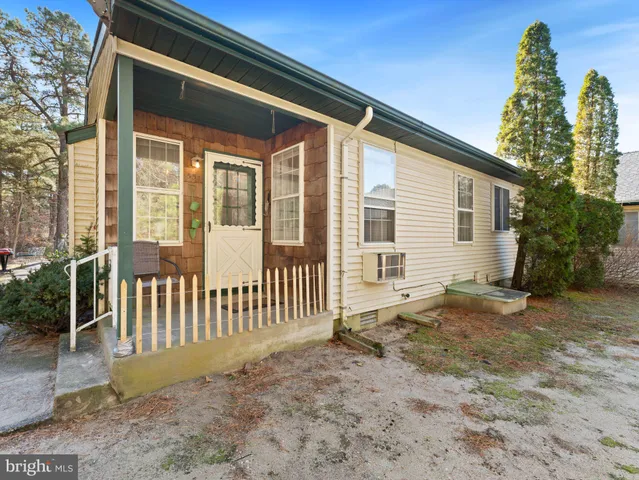 a view of a car parked on the side of the road