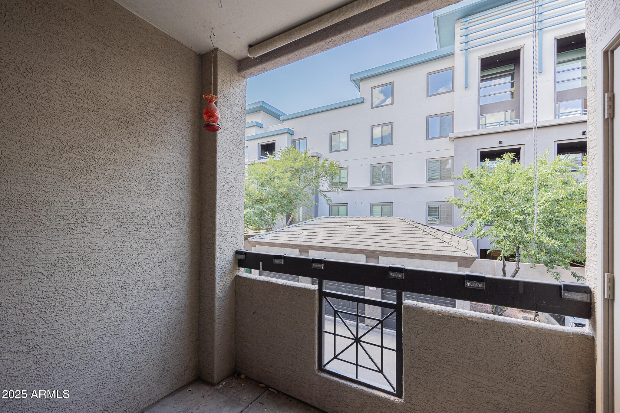 435 West Rio Salado Parkway, Unit 229 Tempe, AZ 85281 - Photo 25 of 26 a view of backyard with a sink and wooden floor