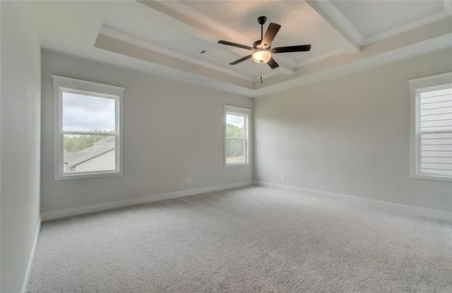 an empty room with fan