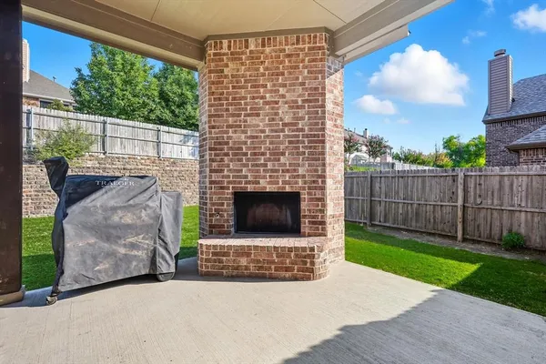 a view of a porch in front of a building