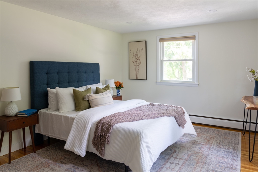 26 Hodge Road Arlington, MA 02474 - Photo 10 of 17 a bedroom with bed and window