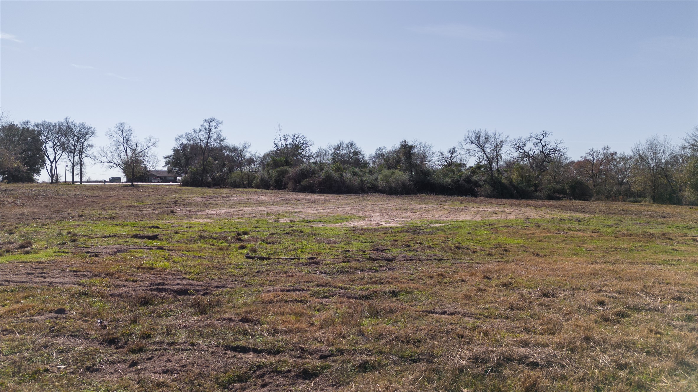 6 Wallace Road Midway, TX 75852 - Photo 6 of 11 a view of a field with trees in background