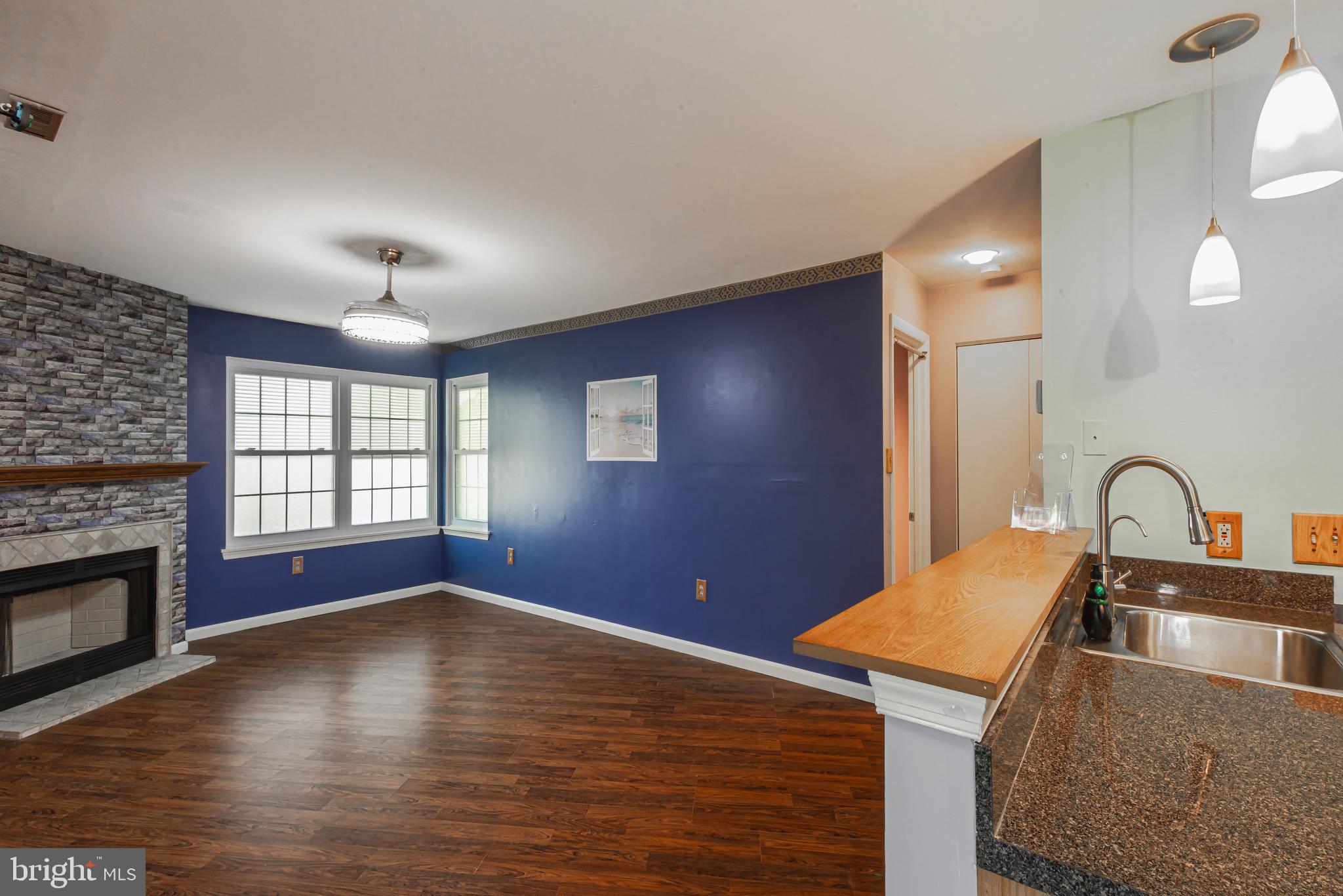 197 Meadow Ridge Road Absecon, NJ 08205 - Photo 6 of 18 Living Room/Wood burning fireplace