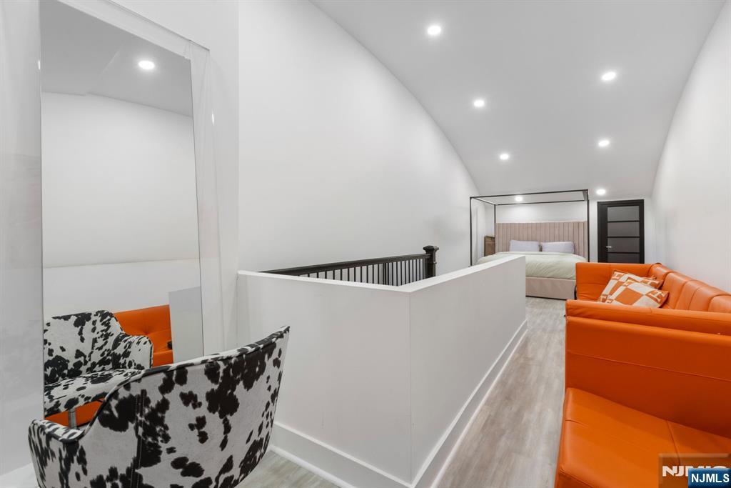 12 Smoke Rise Road Butler, NJ 07405 - Photo 14 of 21 a living room with furniture and a floor to ceiling window