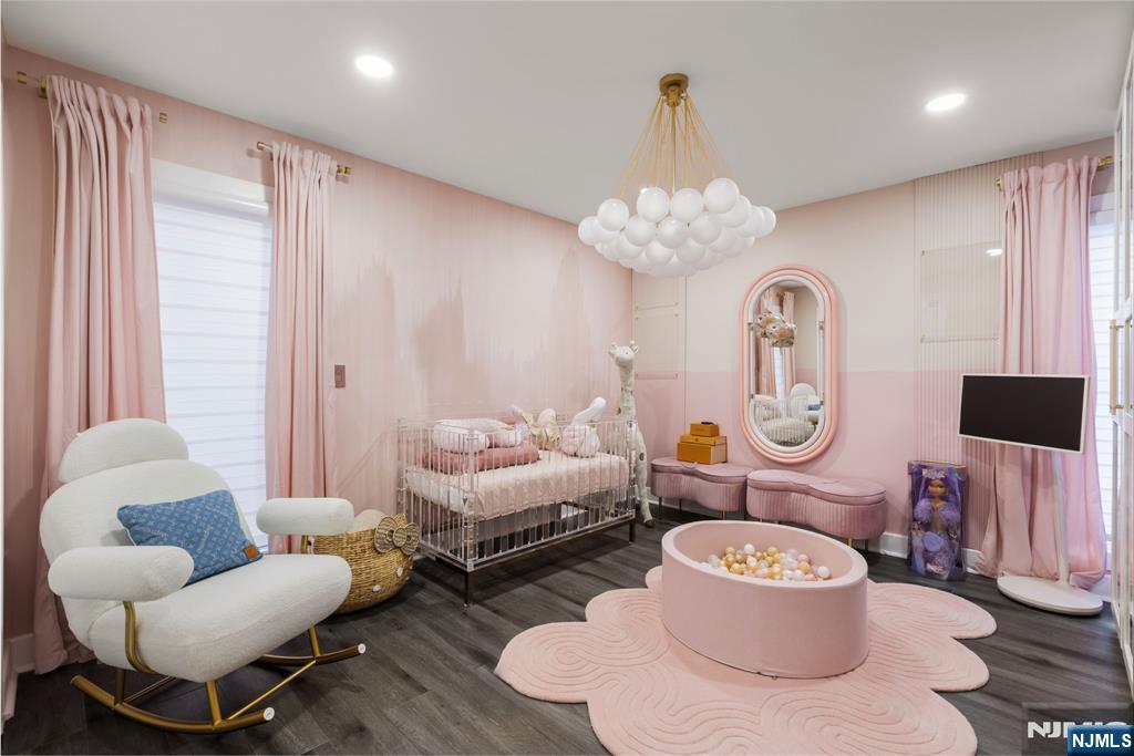 12 Smoke Rise Road Butler, NJ 07405 - Photo 15 of 21 a living room with furniture and a chandelier