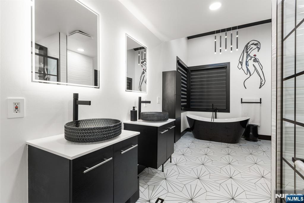 12 Smoke Rise Road Butler, NJ 07405 - Photo 16 of 21 a kitchen with a stove and a sink