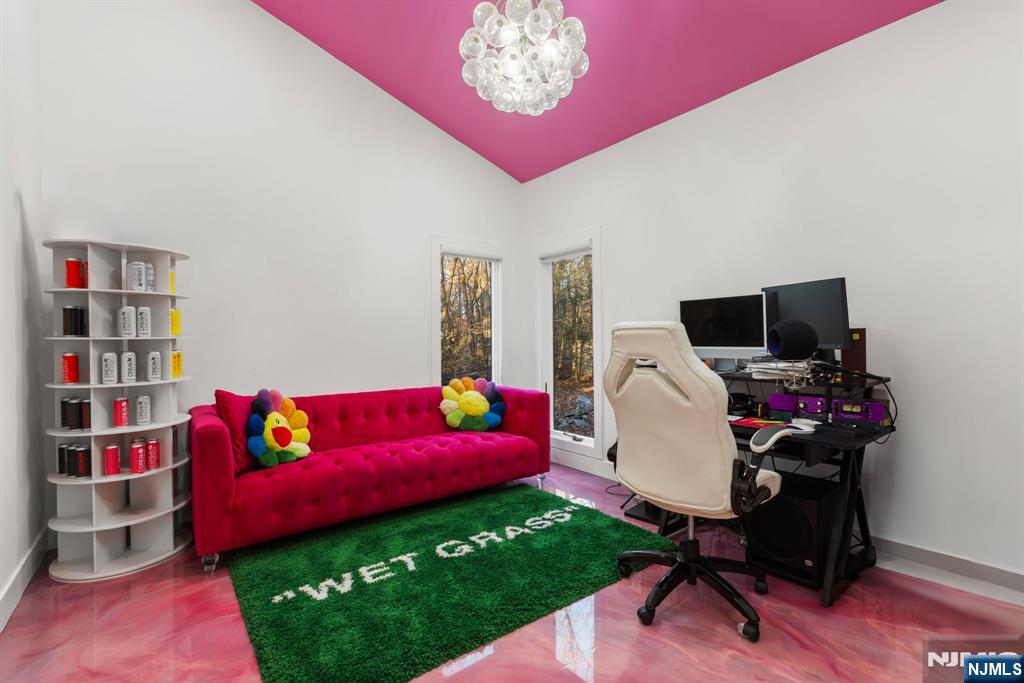 12 Smoke Rise Road Butler, NJ 07405 - Photo 17 of 21 a living room with furniture and a floor to ceiling window