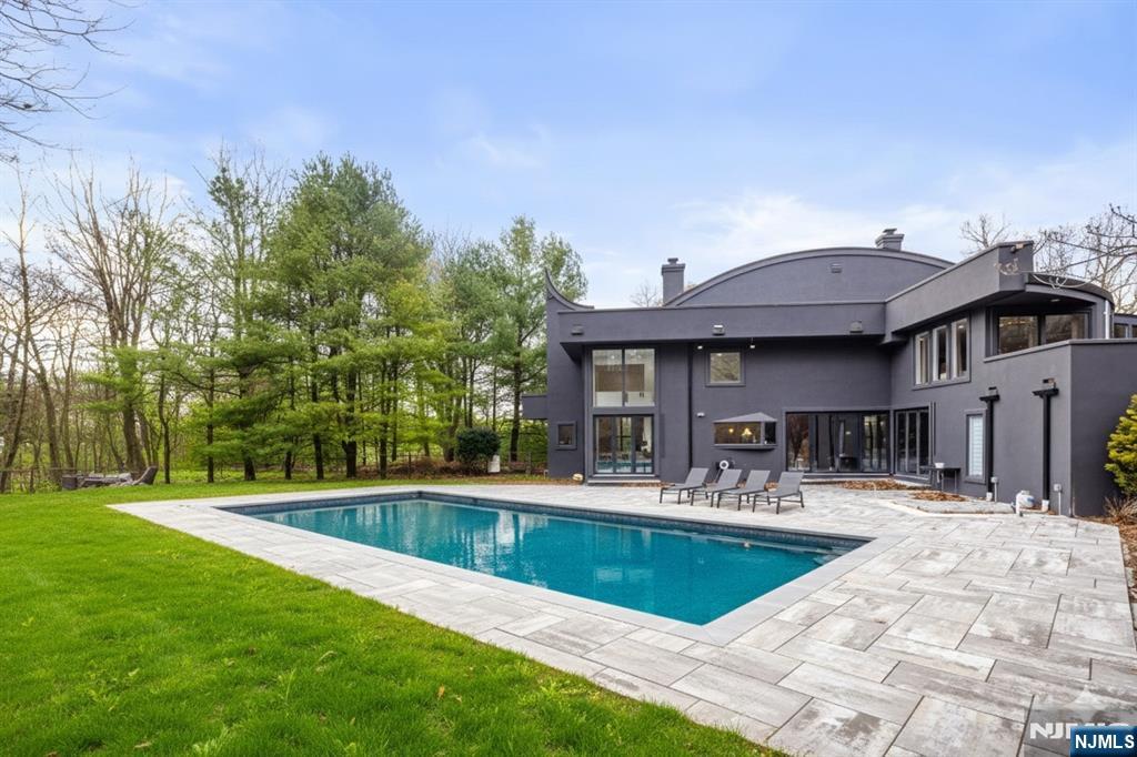 12 Smoke Rise Road Butler, NJ 07405 - Photo 19 of 21 a view of outdoor space yard swimming pool and patio