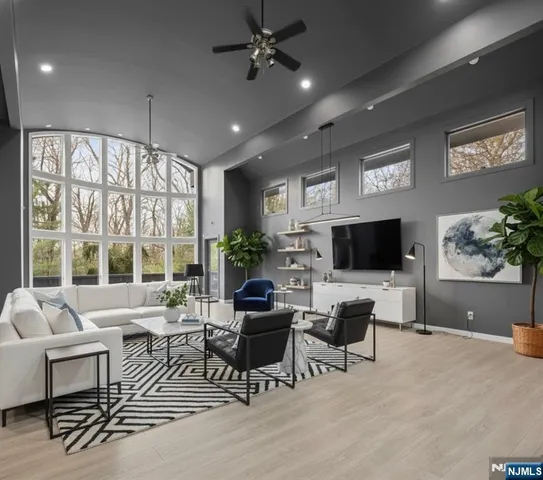 a view of a hallway with seating space