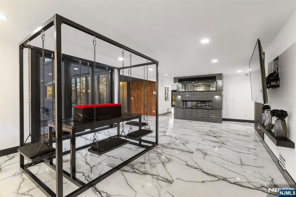 12 Smoke Rise Road Butler, NJ 07405 - Photo 5 of 21 a view of a living room with furniture and a flat screen tv
