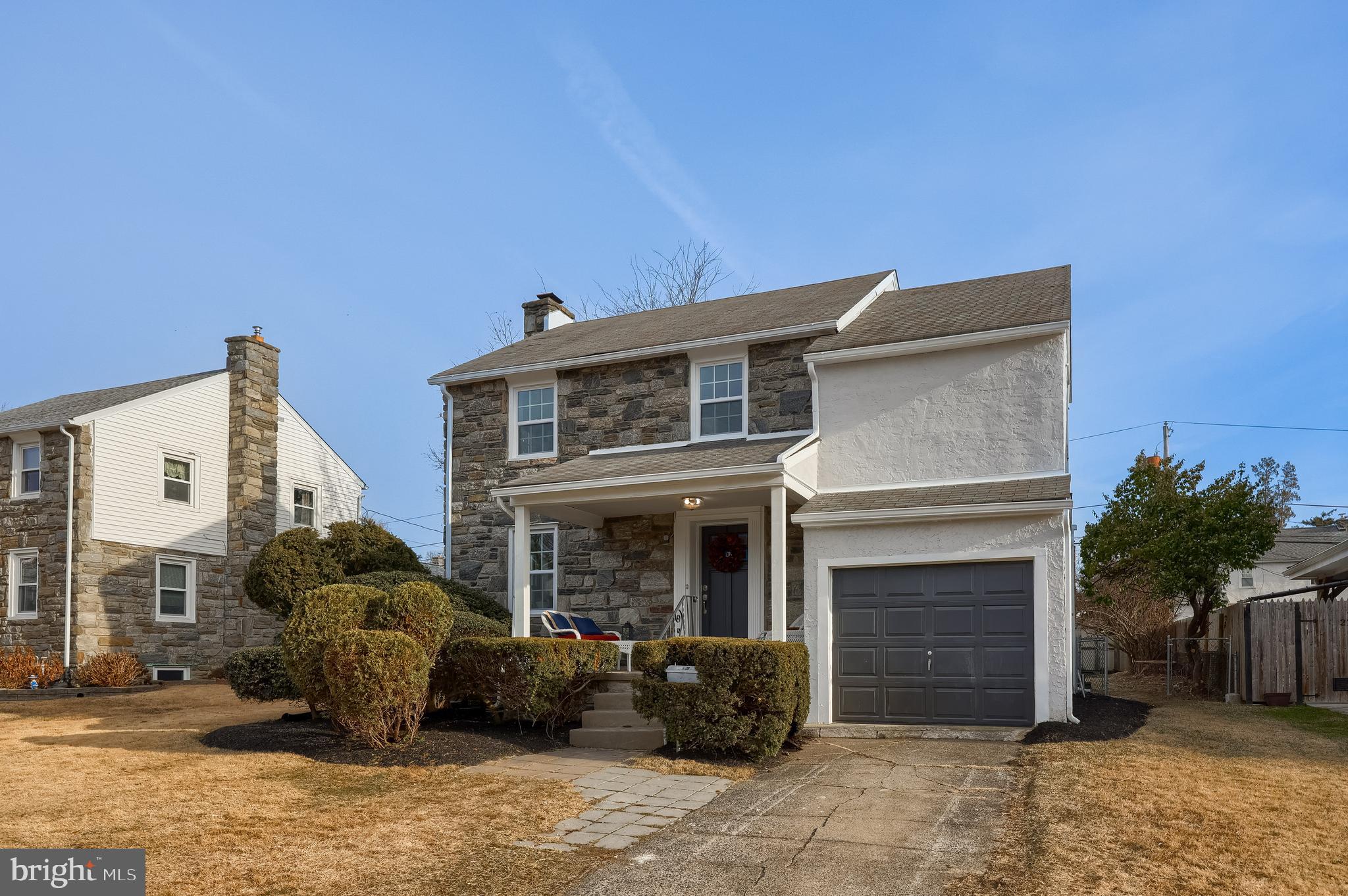 31 Wayfield Road Springfield, PA 19064 - Photo 3 of 49 a front view of a house with a garden