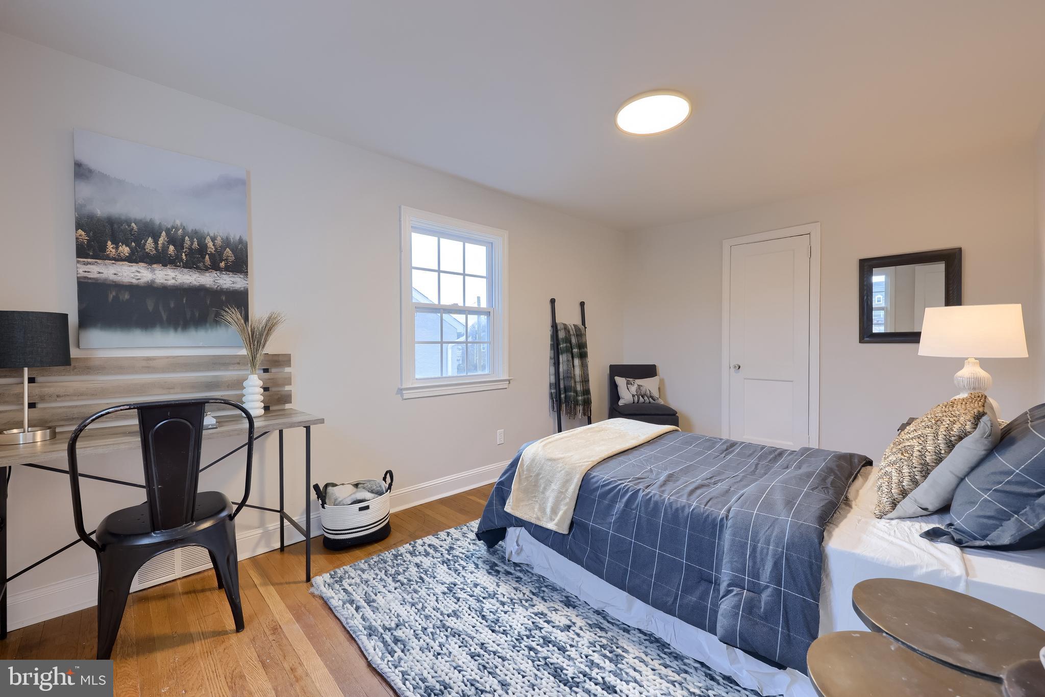 31 Wayfield Road Springfield, PA 19064 - Photo 32 of 49 a bedroom with a bed chair and window