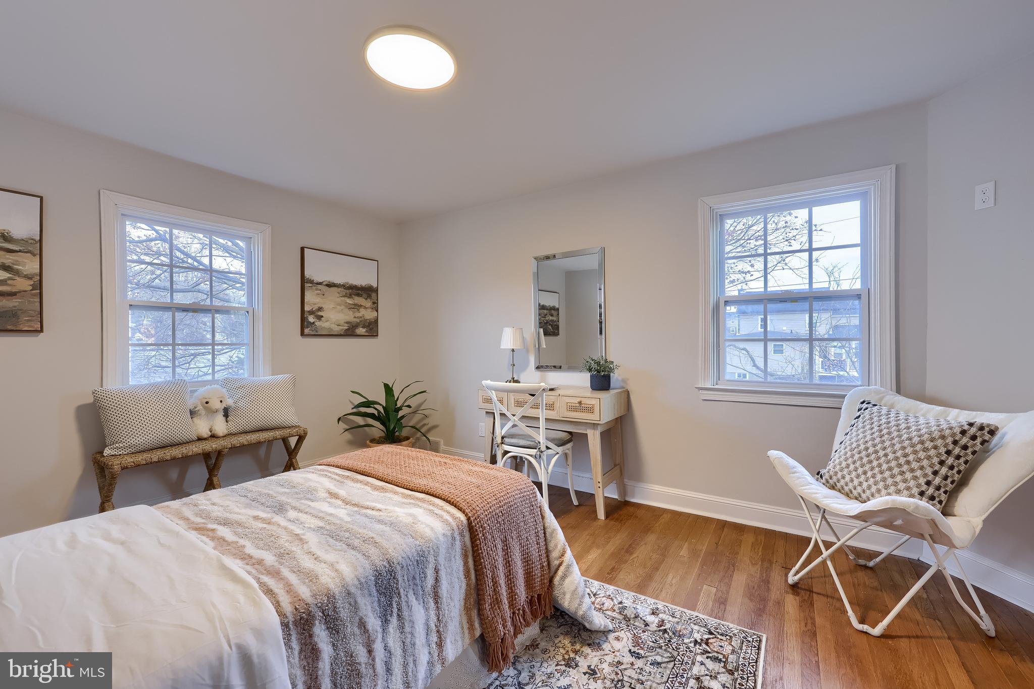 31 Wayfield Road Springfield, PA 19064 - Photo 34 of 49 a bedroom with a bed and a chair