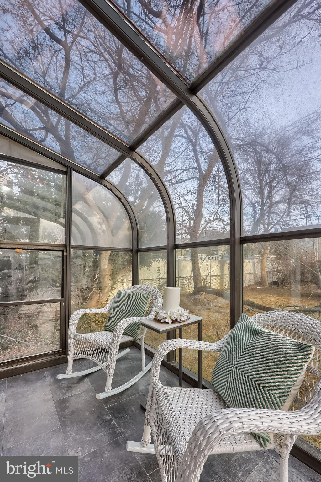 31 Wayfield Road Springfield, PA 19064 - Photo 36 of 49 a living room with furniture and a floor to ceiling window