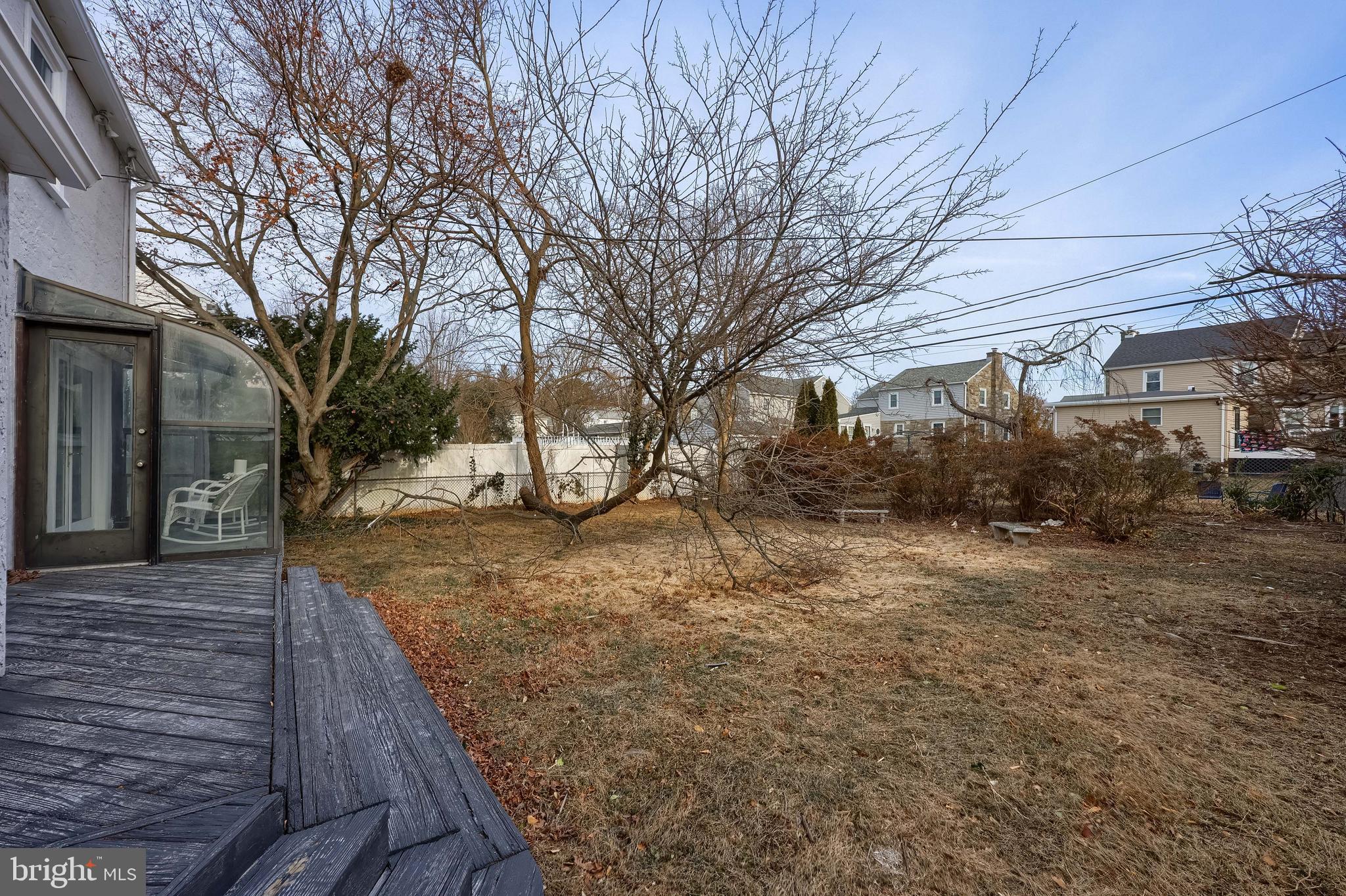 31 Wayfield Road Springfield, PA 19064 - Photo 39 of 49 a view of a backyard with wooden fence