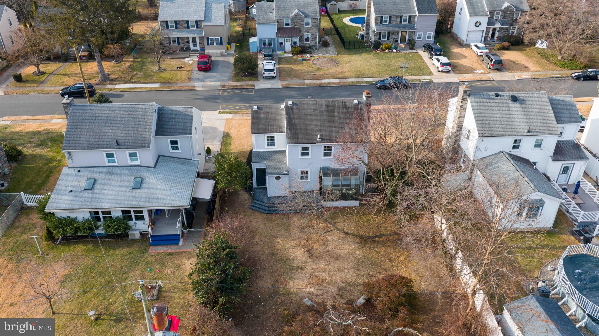 31 Wayfield Road Springfield, PA 19064 - Photo 46 of 49 a aerial view of a house with swimming pool