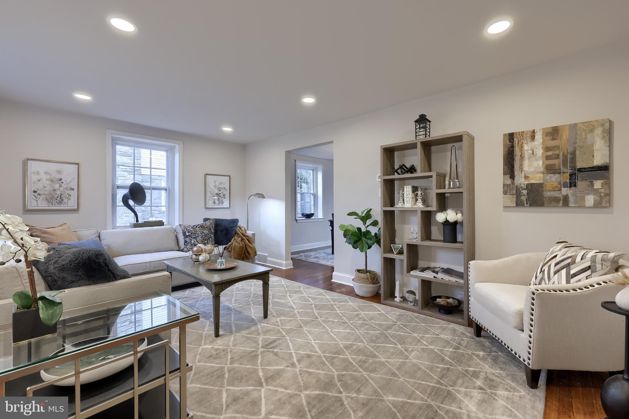 31 Wayfield Road Springfield, PA 19064 - Photo 5 of 49 a living room with furniture and a couch