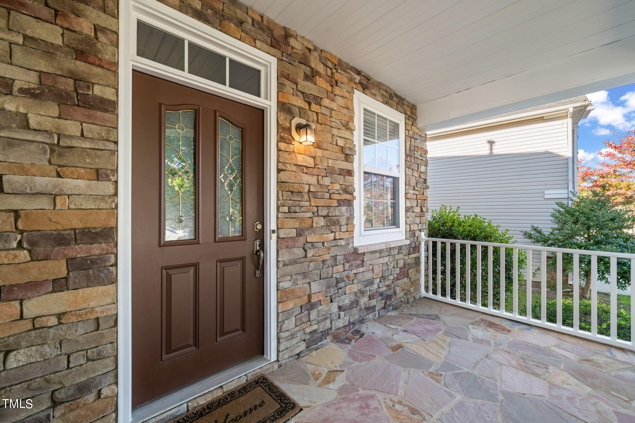 4040 Wester Road Raleigh, NC 27604 - Photo 3 of 35 a view of a brick house with a large window