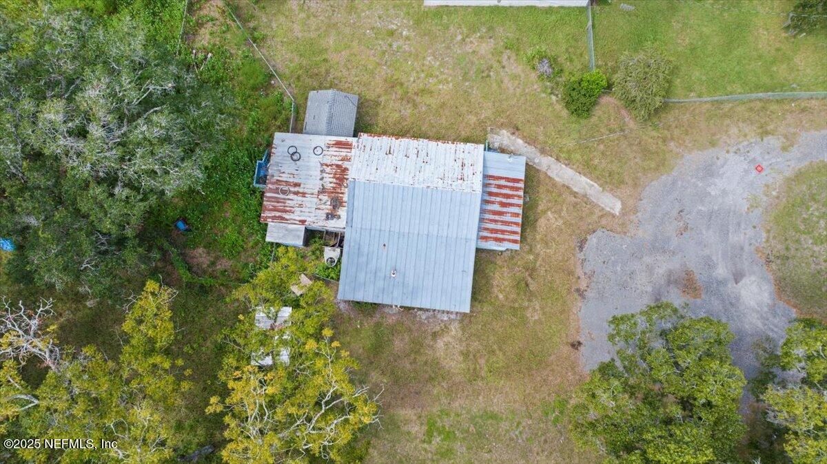 9044 Crystal Springs Road Jacksonville, FL 32221 - Photo 3 of 9 an aerial view of a house with a yard