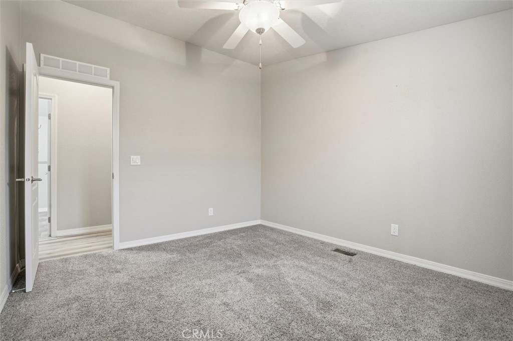 500 Atascadero Road Morro Bay, CA 93442 - Photo 31 of 43 an empty room with a ceiling fan and window